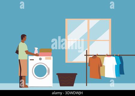A young Black man is washing clothes at his home. He is using a washing machine, and clothes hang on a line nearby. Sunlight shines through a window, Stock Photo