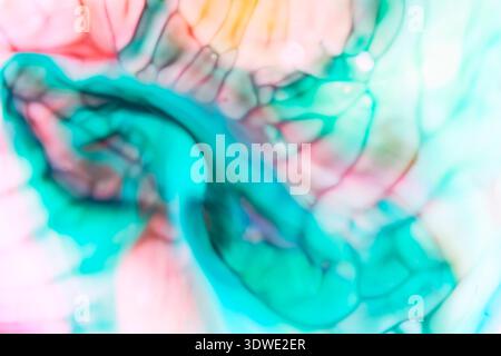 A mesmerizing display of color swirls and brushstrokes, showcasing a vibrant, impressionistic style. This abstract art captures a dreamy, fluid motion Stock Photo
