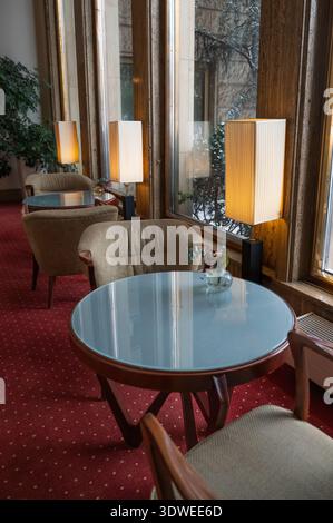 Cozy hotel lounge. Charming corner with scenic view and comfortable seating Stock Photo