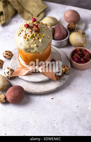 Traditional Easter cake kulich with pistachio Stock Photo