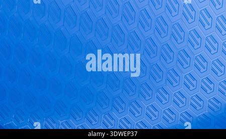 A striking abstract rendering featuring a blue geometric pattern. The design intricately weaves hexagonal shapes, creating a sense of depth and modern Stock Photo