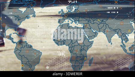 Displaying semi-transparent global map HUD on wooden deck with hex grid, markers, blurred leg Stock Photo