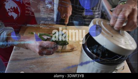 Chopping couple's hands slicing basil with knife on board in kitchen, red apron, digital overlays Stock Photo