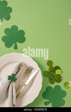 St Patrick green table decor with shamrock and coins Stock Photo