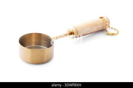 One golden scoop isolated on white. Kitchen utensil Stock Photo