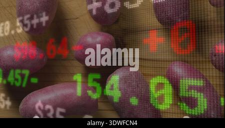 Displaying purple potatoes on wooden cutting board in kitchen, showing LED stock numbers overlay Stock Photo