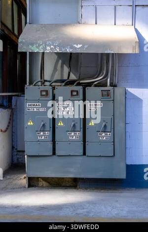 Ulyanovsk, Russia - August 20, 2022: Old control cabinet by the wall. A large electrical control box of the aviaplant. Stock Photo