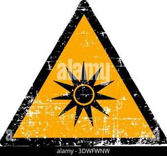 Vector illustration of an optical radiation hazard sign with a grunge texture. Worn scratched yellow triangle symbol showing radiating light from a point isolated on white background. Meets international safety sign standards including ISO 7010 W027 ANSI Z535 OSHA and DIN 4844. Distressed industrial danger emblem for occupational health. Stock Vector