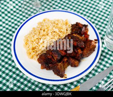 Homemade tasty grilled beef stroganoff with basmati rice Stock Photo