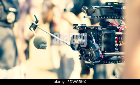Close shot of the professional ARRI cinema camera on a tripod during the backstage filming of the Six Stars movie set in Tampa, FL. Stock Photo