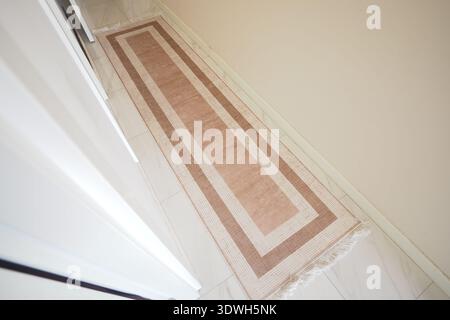 Long rug placed in hallway of a home Stock Photo