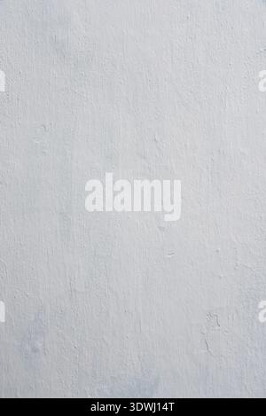 Clay wall is whitewashed by lime, textured background Stock Photo