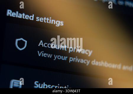 Close-up of digital screen showing account privacy settings and security dashboard options on a dark user interface, cybersecurity and data protection Stock Photo