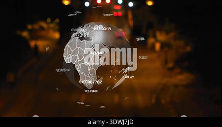 Hovering hologram globe displaying Africa map over night street, with blurred lights, hex overlays Stock Photo