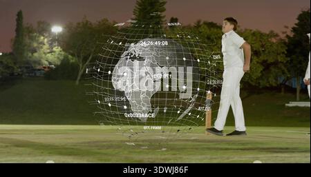Projecting holographic globe hovering over wickets, four players in white uniforms moving at crease Stock Photo