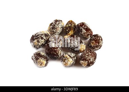 Pitted dates isolated on white background. dates filled with peanut butter and sprinkled with coconut flakes Stock Photo