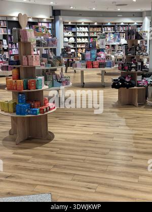 Pforzheim Germany Februar 25, 2026 Bright Boutique Display Of Colorful Selfcare Items On Circular Wooden Stock Photo