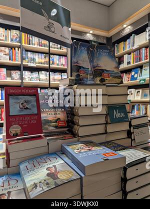 Pforzheim Germany Februar 25, 2026 Stacked Bestseller Table With Closeup Covers, Multiple Titles Piled, Stock Photo