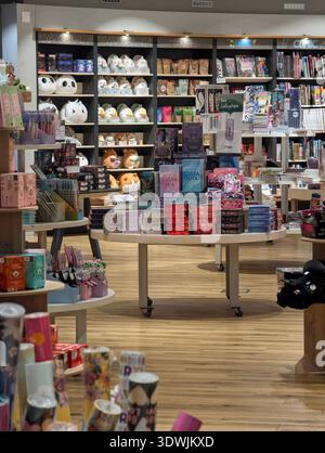 Pforzheim Germany Februar 25, 2026 Round Table Stacked With Ceramic Mugs Stationery And Giftware, Pastel Stock Photo