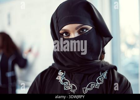 Niqab, portrait and business with muslim woman at conference for professional, about us and pride. Global ambassador, middle eastern representative Stock Photo