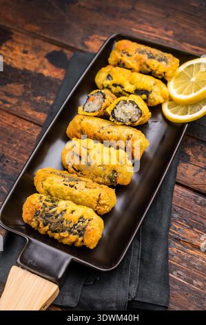 Nori Roll Gimmari, Kimmari Korean Snack with Minced Chicken and Seaweed Wrap. wooden background. top view. Stock Photo