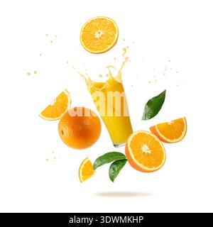 Fresh orange fruit whole and slices and glass of splashing juice with drops and leaves falling flying isolated on white background. Stock Photo