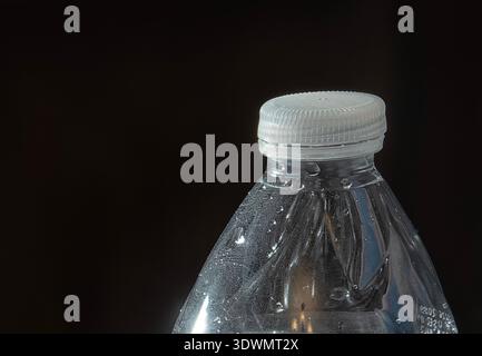 The top of a clear plastic water bottle Stock Photo