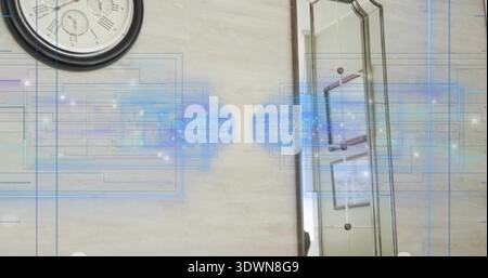 Displaying central blue digital overlay glowing on beige wall, showing clock and mirror reflection Stock Photo