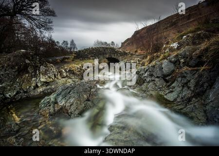 Ashness Stone Bridge on the road to Watendlath Tarn from Borrowdale in the Lake District, Lake District National Park Stock Photo