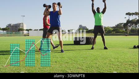 Pressing three men with hex dumbbells training on sports field, wearing sportswear, tire and chart Stock Photo