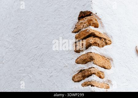 Old building where the construction is reinforced with stone blocks. Ronda, Málaga, Andalucía, Spain, Europe Stock Photo