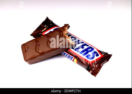 Kyiv, Ukraine. February 14, 2024.Chocolates with a missing bite.Healthy version of chocolate bars.Snickers is the best selling brand chocolate bars in Stock Photo