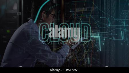 Sorting network cables, tech wearing blue shirt, glasses with tablet in server row, CLOUD hologram Stock Photo