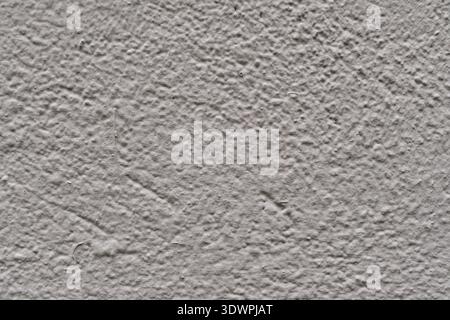 Close-up of rough gray textured cement surface Stock Photo