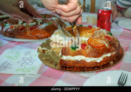 BURELA, SPAIN - FEBRUARY 27, 2026: Close-up of a homemade Roscon de Reyes featuring colorful candied fruit toppings and granulated sugar. The image ca Stock Photo