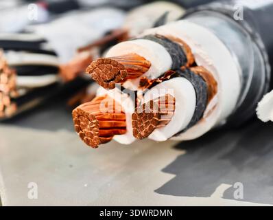 Powerful connections emerge from well-engineered electrical wires used in modern construction and infrastructure projects across urban landscapes Stock Photo