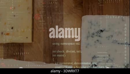 Displaying wooden cutting board topped with three cheeses and faint binary code overlay on tabletop Stock Photo