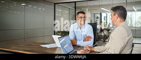Stock exchange market traders working on financial trading charts analysis. Stock Photo