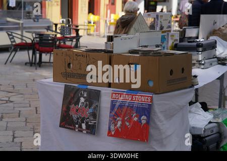 Vintage vinyl records and turntables at street market stall.Menton,France Stock Photo
