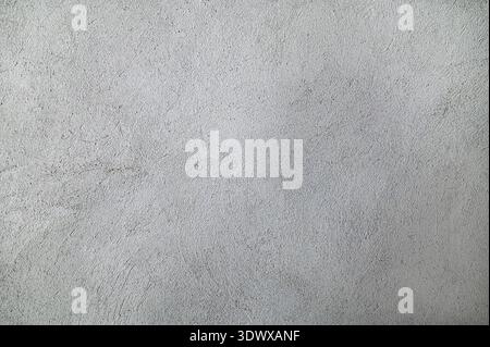 The texture of the plastered white wall with a deep homogeneous structure.rough uniform texture of stucco plaster wall Stock Photo