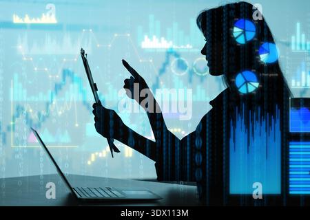 Double exposure of graphs and silhouette of young businesswoman. Data science concept Stock Photo