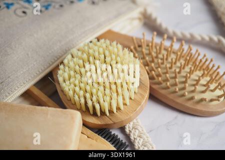 Various hair brushes and accessories on a flat surface Stock Photo
