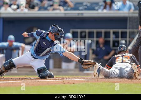 Catching A Baseball Example Detroit Tigers catcher Eduardo Valencia bats during the third inning of ...