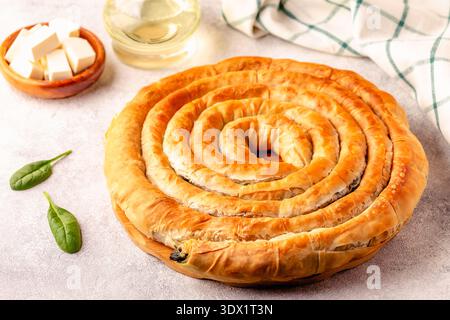 Spanakopita, greek phyllo pastry pie with spinach and feta cheese filling Stock Photo