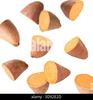 Sweet potato pieces falling against white background Stock Photo