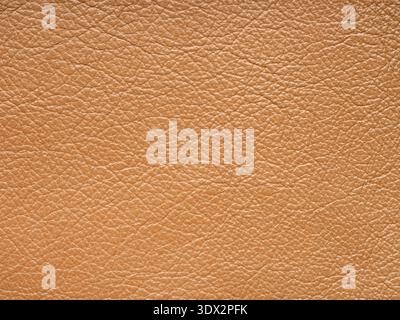 Orange quality leather, natural material with design lines pattern. Can use wallpaper or backdrop luxury event, design upholstered furniture, clothing Stock Photo