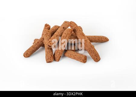 Chocolate filled cereal sticks pile isolated on white Stock Photo