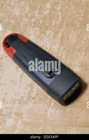 Rechargeable flashlight via dynamo and USB Stock Photo