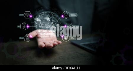 Fourth industrial revolution concept. A man holding a digital globe with icon of AI, IoT, robotics automation, cloud tech, cybersecurity, data analyti Stock Photo