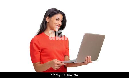 Woman smiling while using laptop, happy and isolated on transparent background Stock Photo